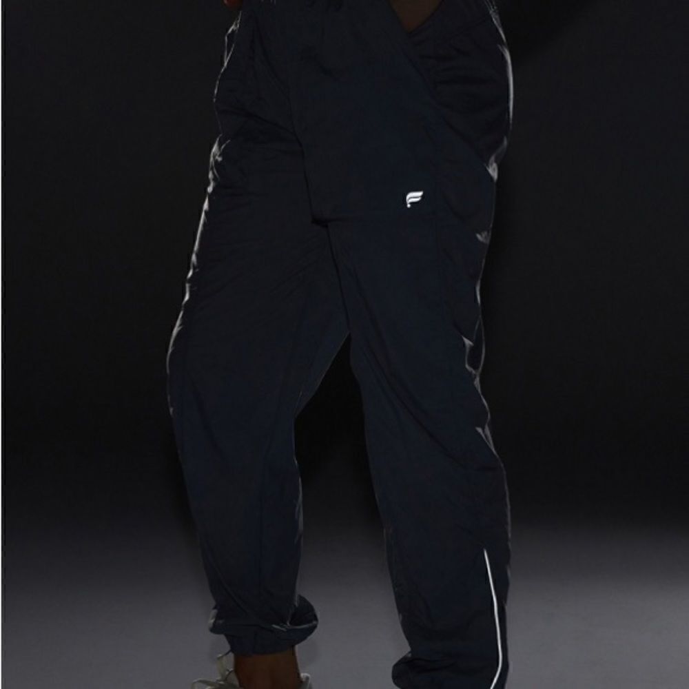 Fabletics Ultra High Waisted Piped Nylon Pants - Picture 5 of 10